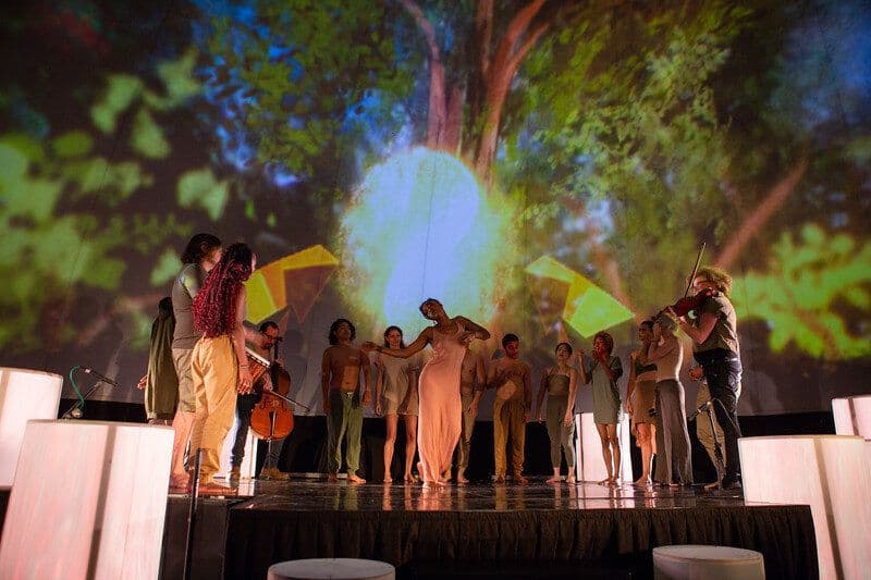 Community gathering at sunset